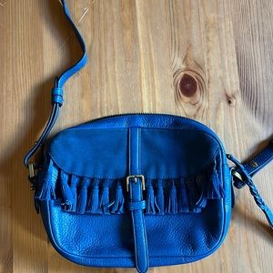 Blue tasseled pebble and suede leather crossbody purse